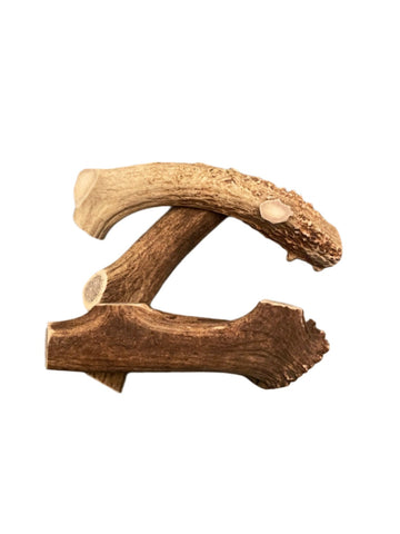 Three-pack naturally shed deer antler dog chews