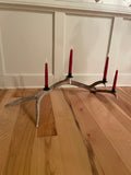 Handcrafted elk antler candelabra with four taper candles by Remington Road